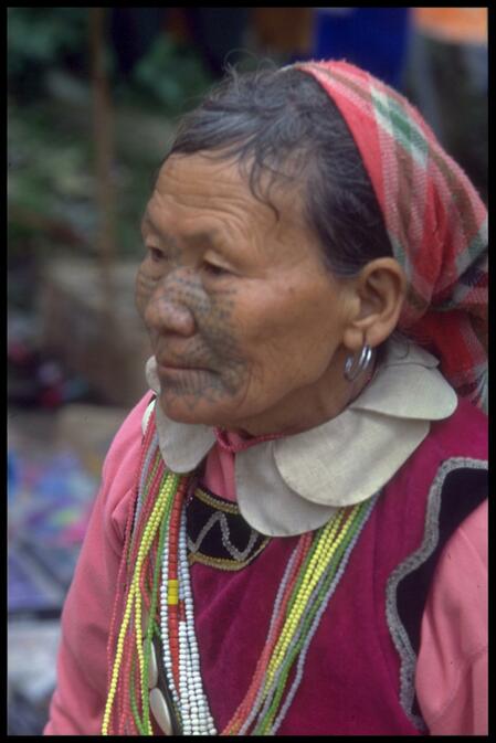 A Dulong woman with face tattoo
