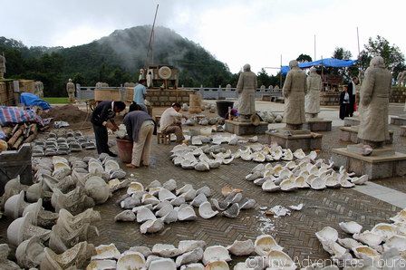 Statue faces being cast