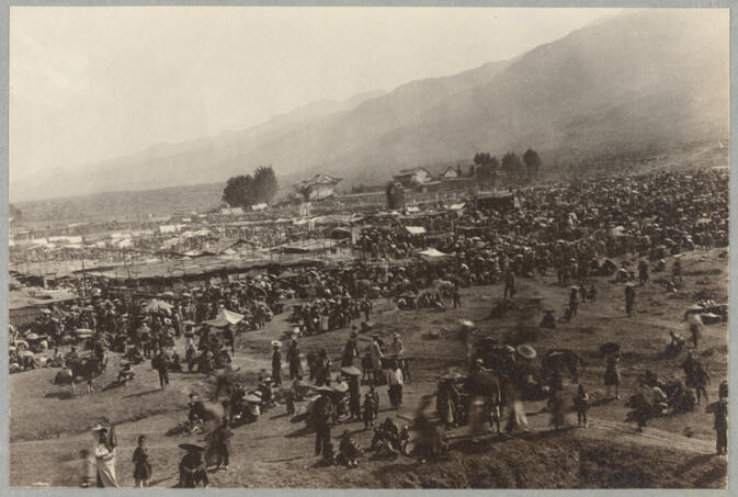 Crowd of people at fairgrounds from above April 15, 1922