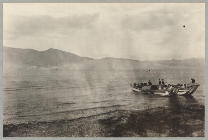 Boat near shore of rippling lake April 30, 1922