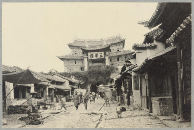 Street with gate and people May 2, 1922