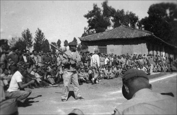 US General Claire Chennault playing baseball in Kunming