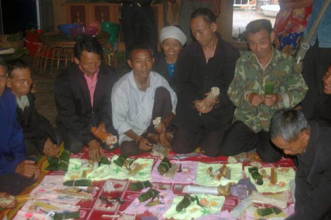Assembling gift packets for the monks during the Buddhist Lent