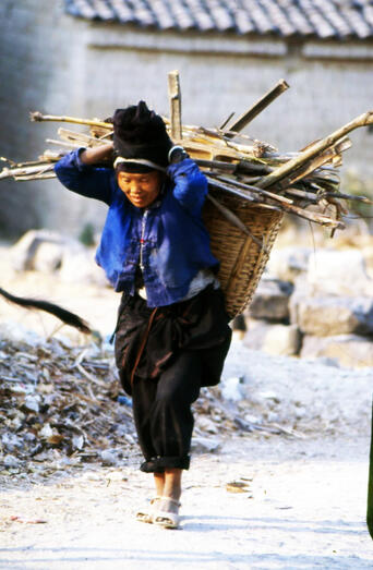 Achang woman returning from the fields