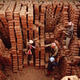 Migrant workers receive bricks in lieu of pay