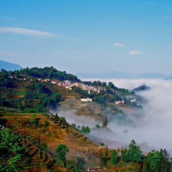 Morning fog rolls in at the Yuanyang rice terraces