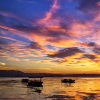 Rainbow clouds at night over Fuxian Lake