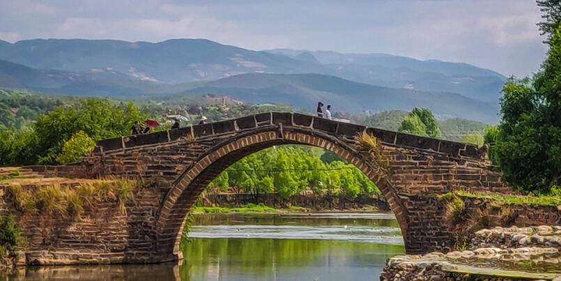 The iconic bridge over the Heihui River in Shaxi, Yunnan
