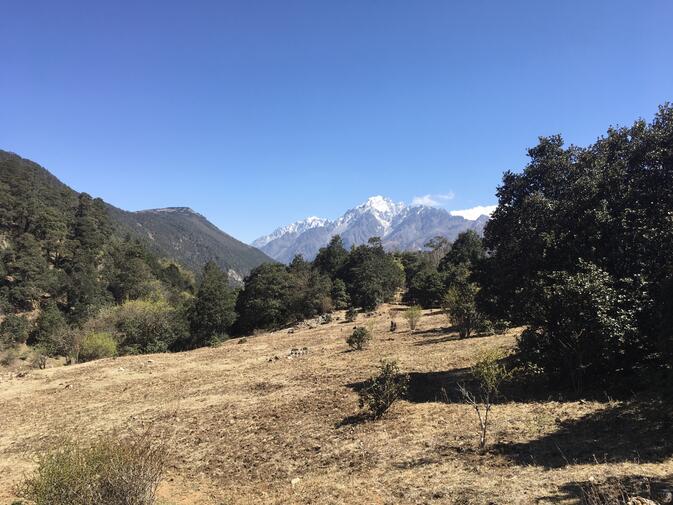 Wenhai Mountain (left) and Jade Dragon Snow Mountain (center). Photo taken at 3,450-meter pass southwest of Wenhai Lake