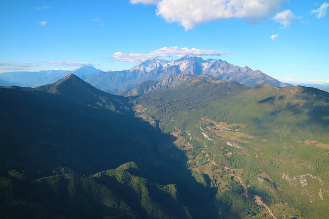 Wenhai Mountain in foreground, Jade Dragon Snow Mountain behind, Haba Snow Mountain background left (image credit: Mike Fougere)