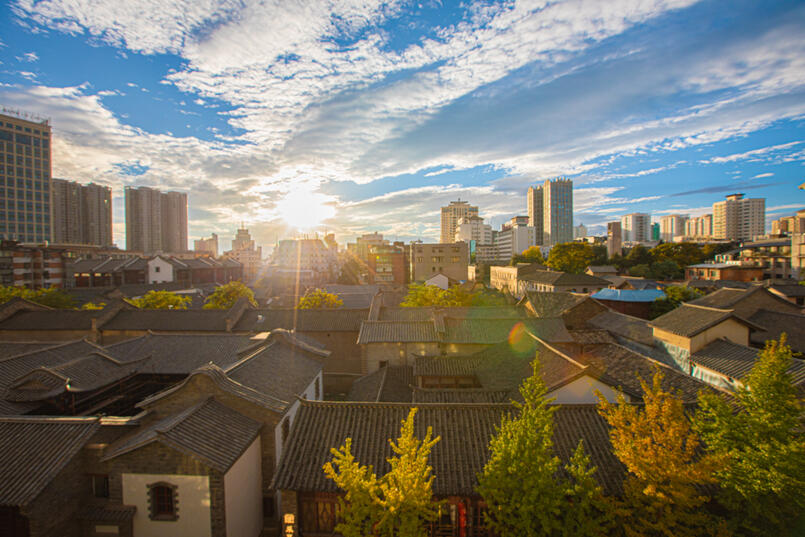 Old street under the setting sun