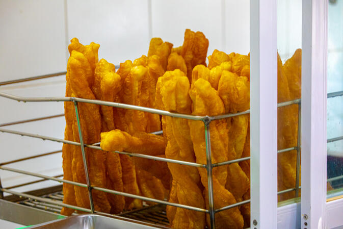Freshly deep fried dough sticks