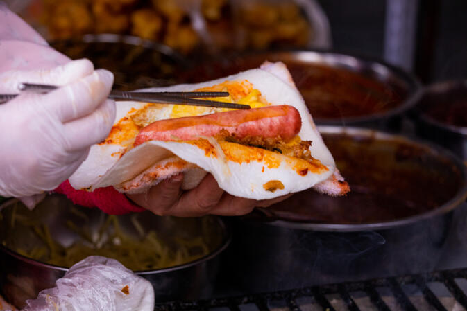 Shao er kuai rolled with sausage and chilly paste