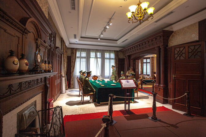  Scene of the meeting on the night of uprising recreated in the conference room by way waxwork diorama