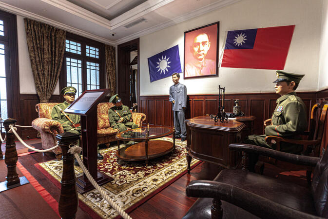 	Scene of the meeting on the night of uprising recreated in another meeting room by way waxwork diorama