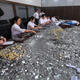 Shop owner fined 68,000 yuan, pays 10,000 in coins