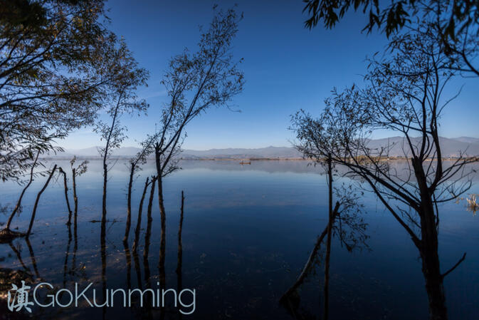 A view across Jian Lake, where local children flock to go swimming during the summer