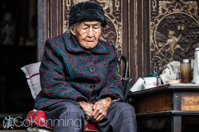 Zhang Dehe, now retired, at home in her garden