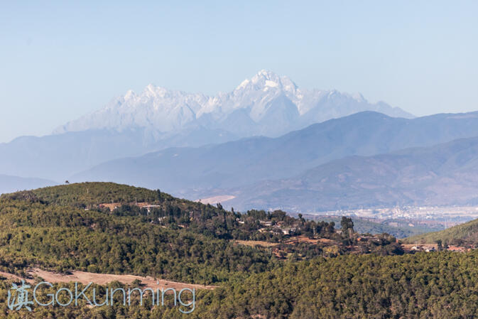 The looming Yulong and Haba massifs, 100 kilometers distant from Shibao Mountain