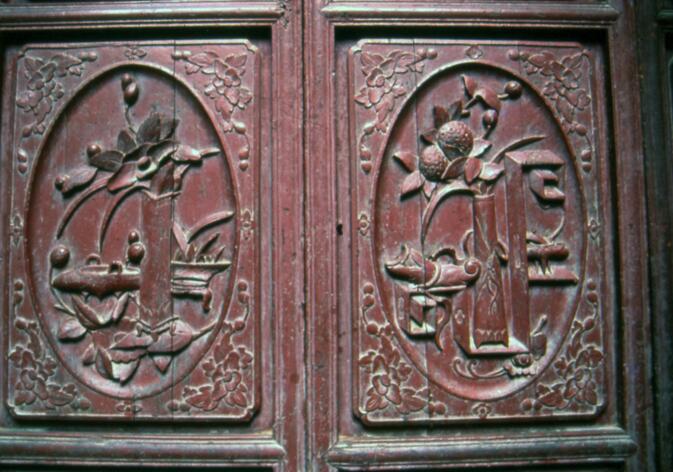 Ornately carved shutters on old Wuyi Lu