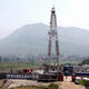 China massively scales back fracking plans