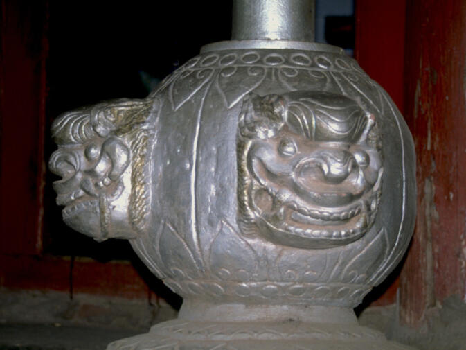 Ornate pillar post at an old Heijing house