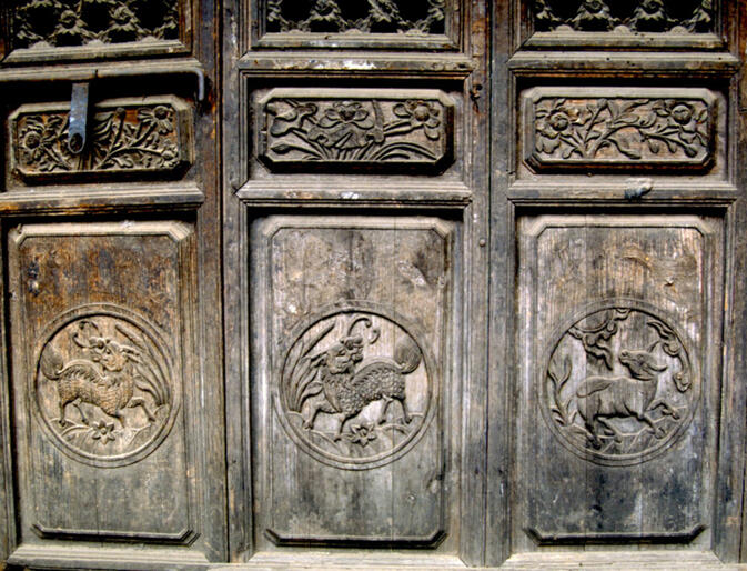 Detail of hand-carved doors
