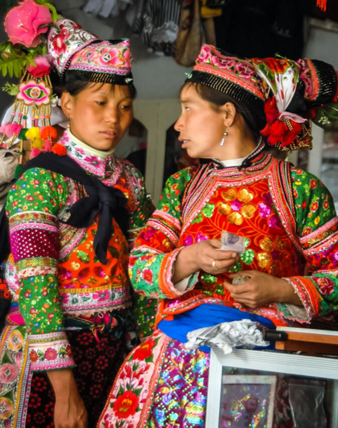 Tuli Yi women, Dacan