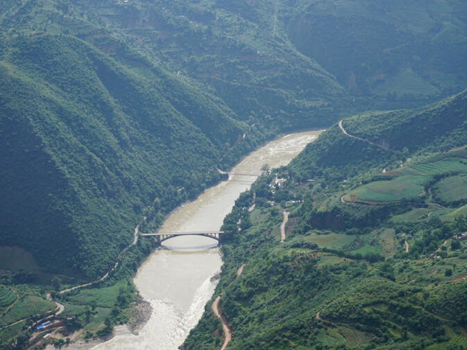 The old and new Huitong bridges. The original is in the background and the new museum will be built on the bluff to the right